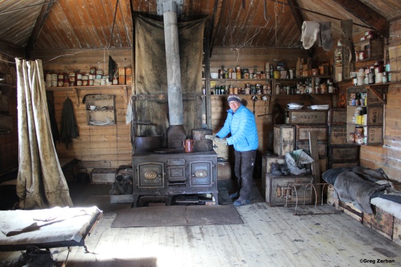 Me inside Shackleton's Cape Royds hut pretending to warm myself over the stove.  The great men that occupied this hut were truly amazing and to experience and feel the history of this place cannot be put into words.  I have read of many of the hardships and have experienced Antarctica personally, but to actually do it they way they did, without modern technology and communications, is mind boggling.  These men were hearty souls who experienced great hardships for little or no glory.  Any of the stories of these men, such as "Shackleton's Forgotten Men" or "Endurance" or the story of RF Scott are well worth the read.  